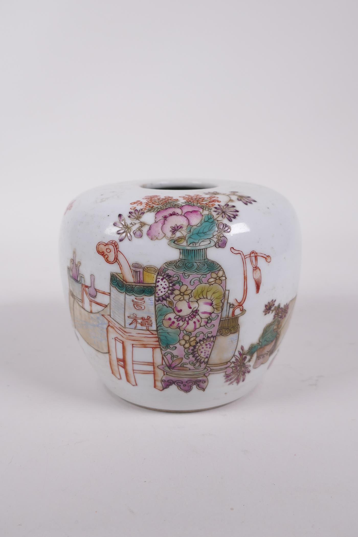 A late C19th/early C20th Chinese famille rose porcelain water pot, decorated with objects of virtue,