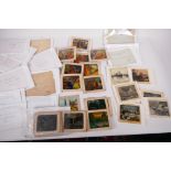 A quantity of antique paper slide panels, various subjects, mainly French