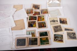 A quantity of antique paper slide panels, various subjects, mainly French