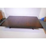 A large low table with bamboo veneered top, 85" x 51" x 13"