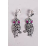 A pair of 925 silver and marcasite drop earrings in the form of owls, 1½" drop