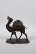 A Chinese bronze censer and cover in the form of a camel with a removable saddle, 4 character mark