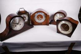 A Westminster chimes mantle clock in architectural oak case, together with four various mantle