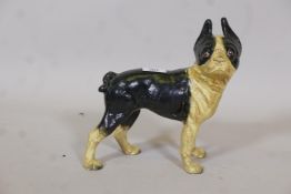 A painted cast iron doorstop in the form of a French terrier, impressed Hubley 1916, 10" high