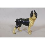 A painted cast iron doorstop in the form of a French terrier, impressed Hubley 1916, 10" high