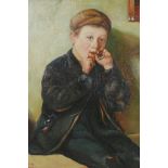 In the manner of Walter Langley, portrait of a boy, oil on canvas laid on board, in a maple frame,