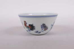 A doucai porcelain tea bowl with chicken decoration, Qianlong seal mark to base, 3" diameter