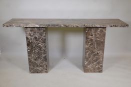 A marble console table on two pedestals, 72" x 18", 33" high