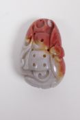 A Chinese russet and grey hardstone pendant with carved bat decoration, 2½"