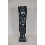 A modernist floor standing bronze reticulated sculpture, 45" high