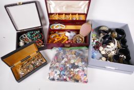 Three boxes of costume jewellery, a box of cuff links and a bag of buttons