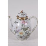 A Japanese eggshell porcelain teapot painted with birds and flowers, 8" high, character marks to