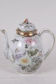 A Japanese eggshell porcelain teapot painted with birds and flowers, 8" high, character marks to