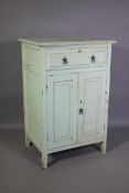 A Victorian painted satin walnut cabinet, with single moulded front drawer over two cupboards,