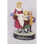 A rare Royal Doulton figure group of a woman with two children, advertising Yardley's Old English