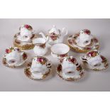 A Royal Albert 'Old Country Rose' pattern tea set comprising six cups and saucers, seven x 6"