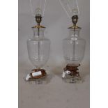 A pair of cut glass table lamps, 18" high