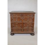 A Queen Anne oak chest, comprising four moulded front drawers and bobbin turned mouldings to the