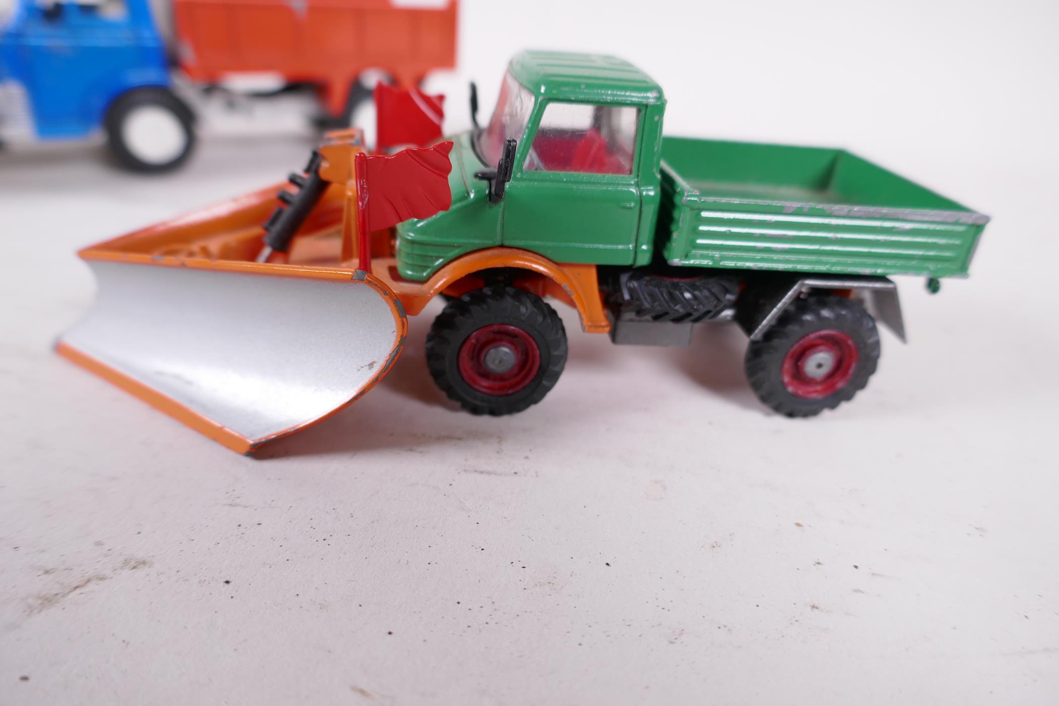 A Dinky Toys Model Ford D800 snow plough, no tailboard, 7" long, together with a Corgi model - Image 2 of 5