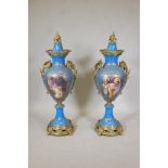 A pair of Sevres style floor vases with brass mounts, decorated with landscapes and women verso, 44"