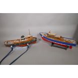 Two scratch built model boats, the tug Brigadier and a motor yacht, radio and power unit A/F,