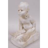 A chalk figurine of a child, signed F.V. Blundstone, 8" high, A/F