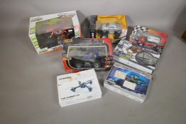 Seven radio controlled model vehicles, boxed, Rock Crawler, Toyota Tundra, Jeep, WRC Mini, Command