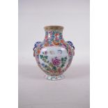 A Chinese millefiori enamel porcelain vase with elephant mask handles, seal mark to base, 5" high