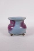 A Jun ware pottery censer raised on tripod supports, 3" high x 4" diameter