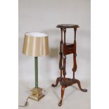A Georgian style mahogany wig stand, 34" high, and a brass table lamp with malachite effect