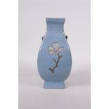 A Song style blue crackle glazed pottery vase with two lug handles, decorated with branches in