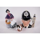 A Royal Doulton figure, New Companions HN2770, 7" high, together with a puppy in a basket HN2586 and