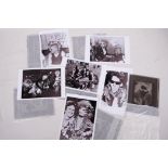 A collection of photographic transparencies of punk rockers together with later black and white