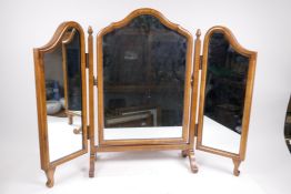 A Queen Anne style walnut triptych dressing table mirror, 29½" high