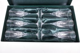 A boxed set of six Thomas Webb crystal champagne flutes, 8" high