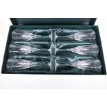 A boxed set of six Thomas Webb crystal champagne flutes, 8" high