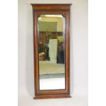 A late C19th Continental burr walnut wall mirror with ebonised moulded slip and detail, 64" x 27"