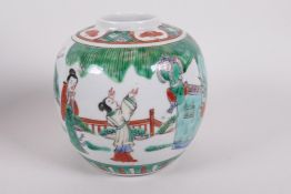 A Chinese porcelain famille vert ginger jar, decorated with figures in a garden, four character mark