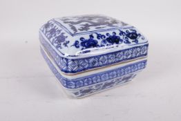A Ming style blue and white porcelain box and cover with dragon decoration, 7" x 7"