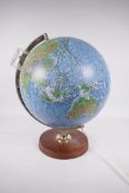 A Philips Illuminated terrestrial globe by George Philips and Son Ltd, London, 11" diameter, with