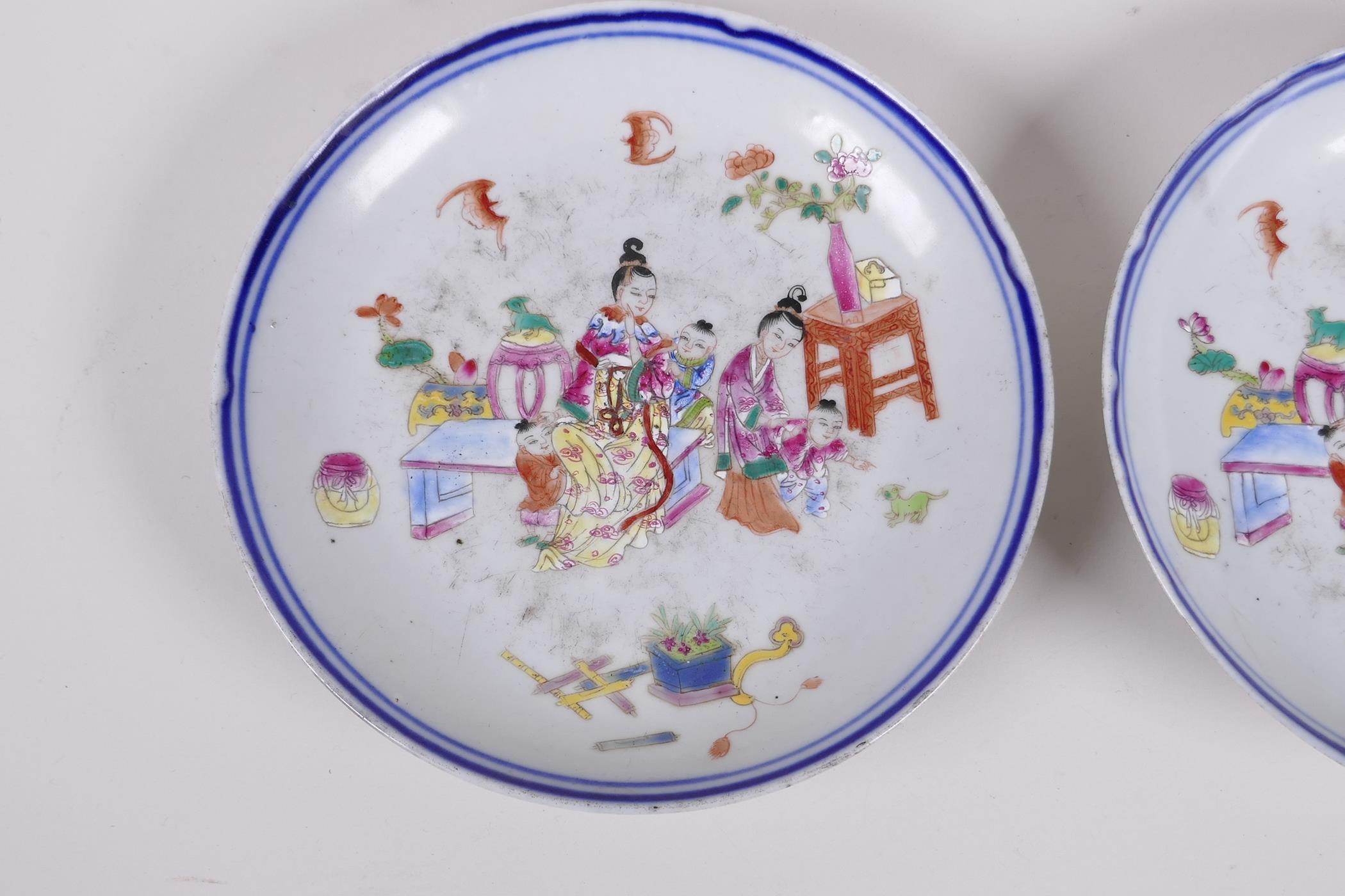 A pair of  C19th Chinese famille rose enamelled porcelain dishes, decorated with women and children, - Image 2 of 4