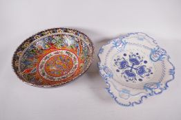 A brightly coloured hand painted bowl in the manner of Thune, 12" diameter, together with an Italian