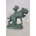A bronze figure of a pitbull dog by a post, 14" high