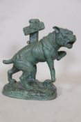 A bronze figure of a pitbull dog by a post, 14" high