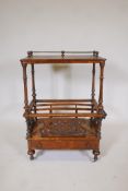 A Victorian inlaid burr walnut canterbury, with brass galleried top and central rack, over a