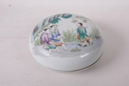 An early c20th famille vert porcelain box and cover decorated with fishermen, four character mark to