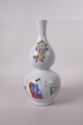 A Chinese famille rose porcelain double gourd vase, decorated with immortals and inscriptions, 10"