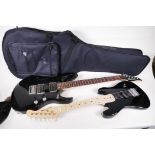 A Maverick electric guitar with roller volume and tone control, 39" long, together with a