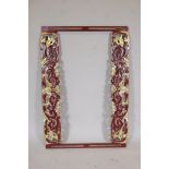 A Chinese carved and painted wood frame with gilt bat decoration, 16" x 36" aperture