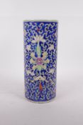 A Chinese polychrome porcelain cylinder vase with lotus flower decoration, seal mark to base, 11"